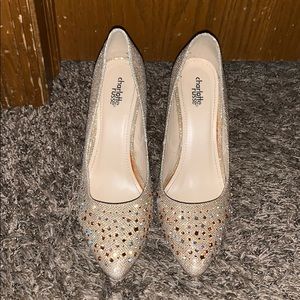 Gold close toe high heels.